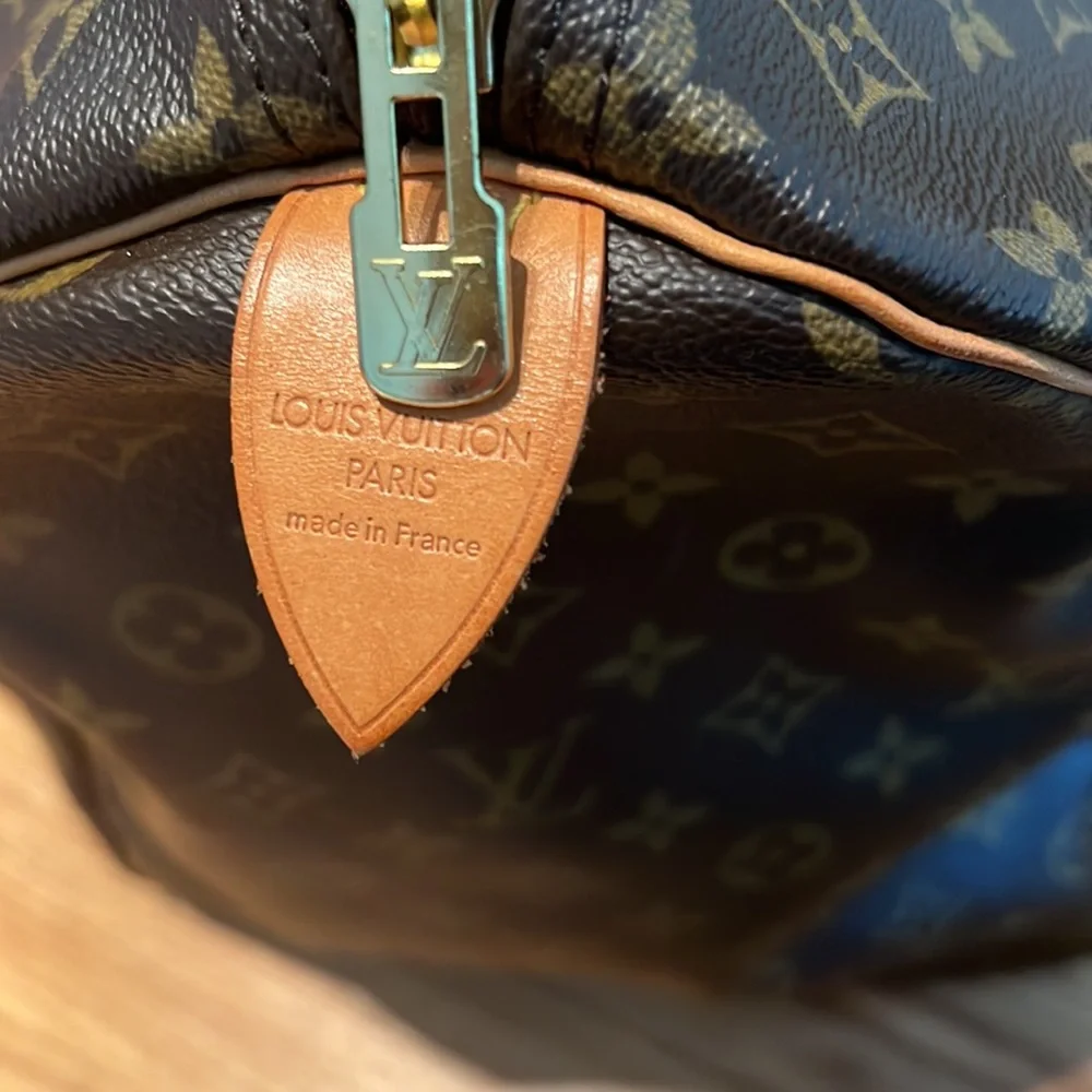- Amazing Keepall bag by Louis Vuitton